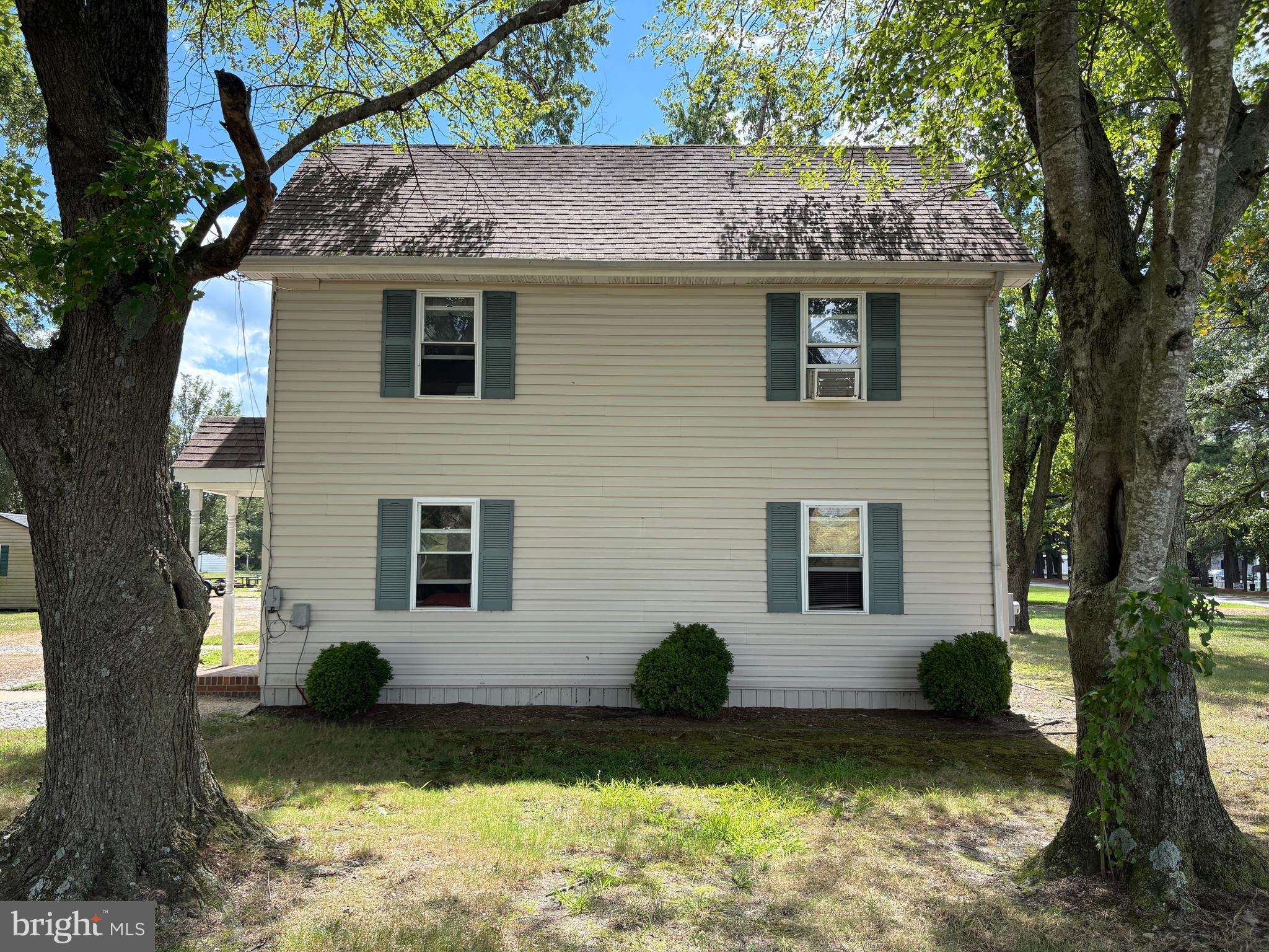 31867 Shavox Road Salisbury, MD 21804 - Photo 5 of 64 a front view of a house with a yard
