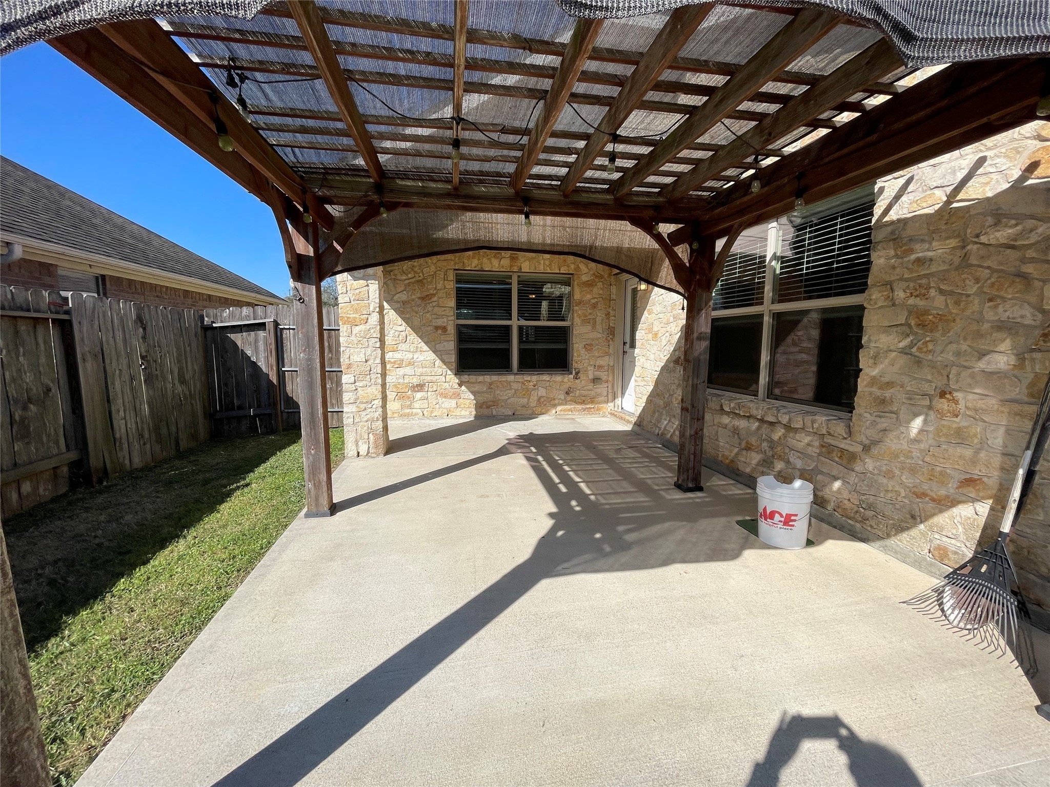 12010 Ramla Place Trail Houston, TX 77089 - Photo 19 of 24 a roof deck with table and chairs and potted plants
