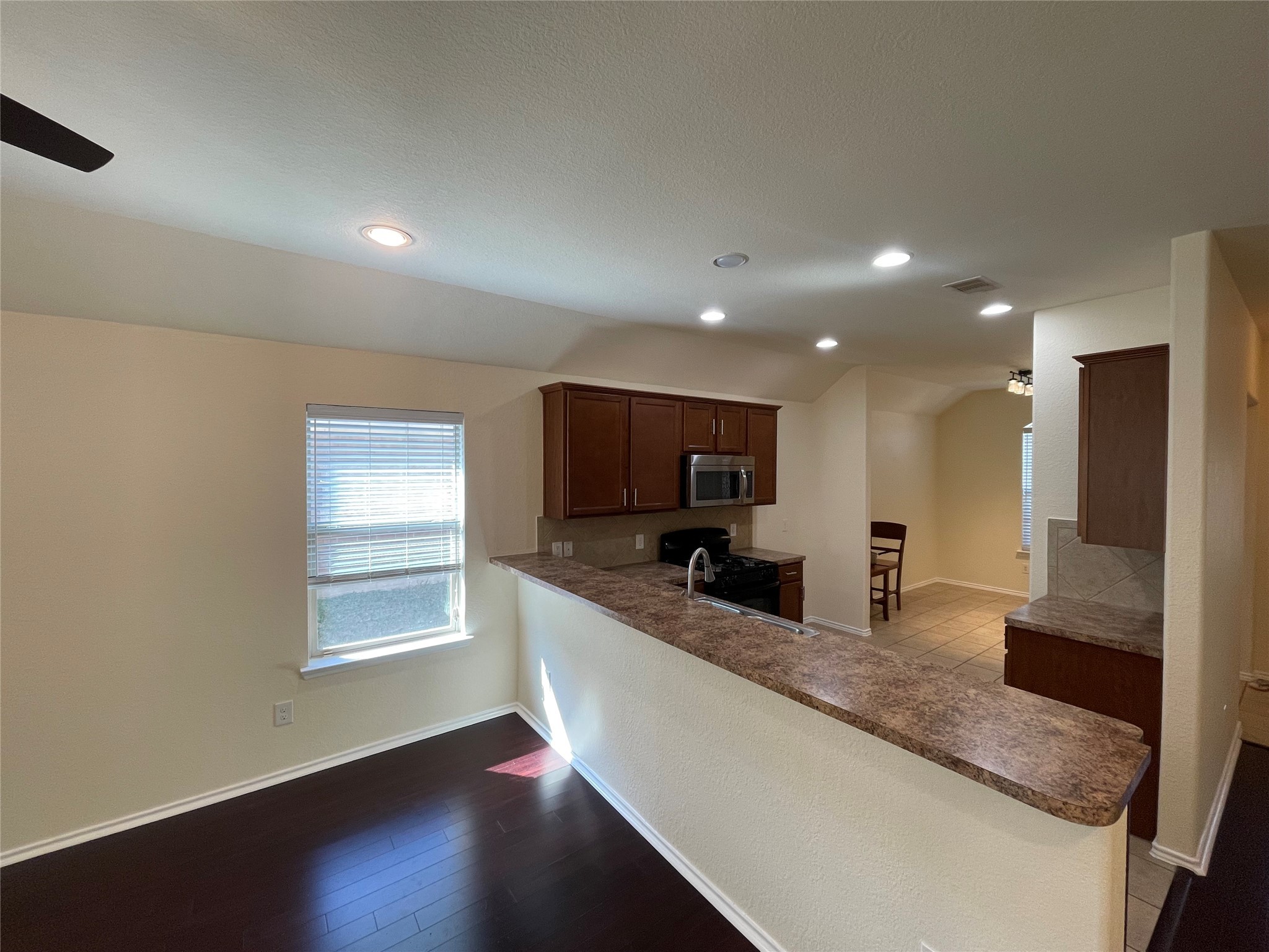 12010 Ramla Place Trail Houston, TX 77089 - Photo 8 of 24 a view of a kitchen with a sink and a large window