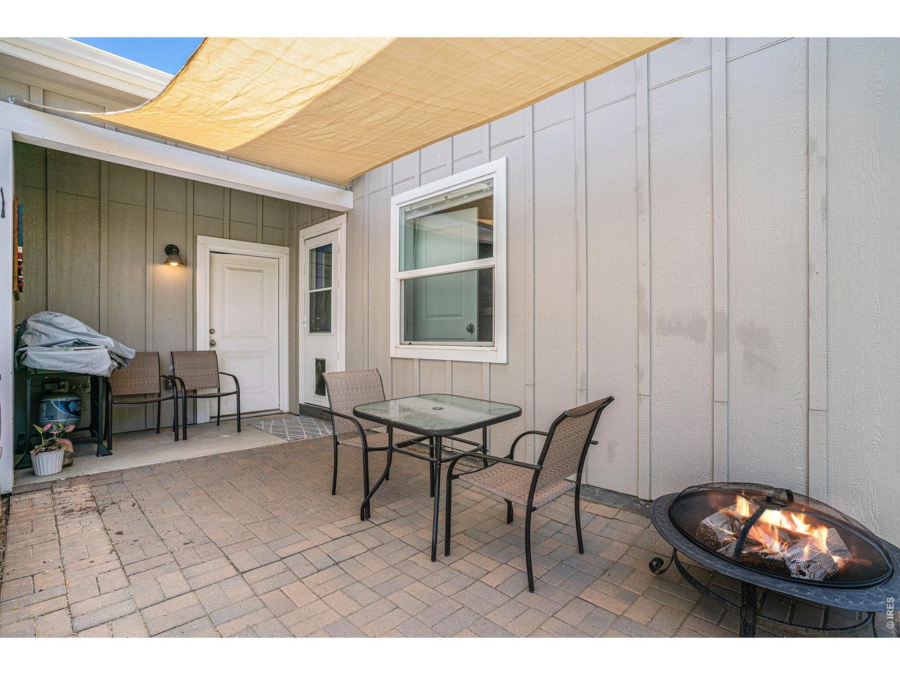 7775 5th Street, Unit 2 Wellington, CO 80549 - Photo 30 of 30 a view of a dinning table and chairs in a patio