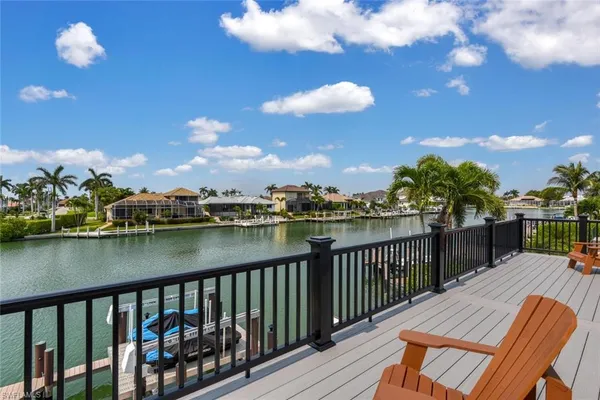 a view of a lake from a balcony