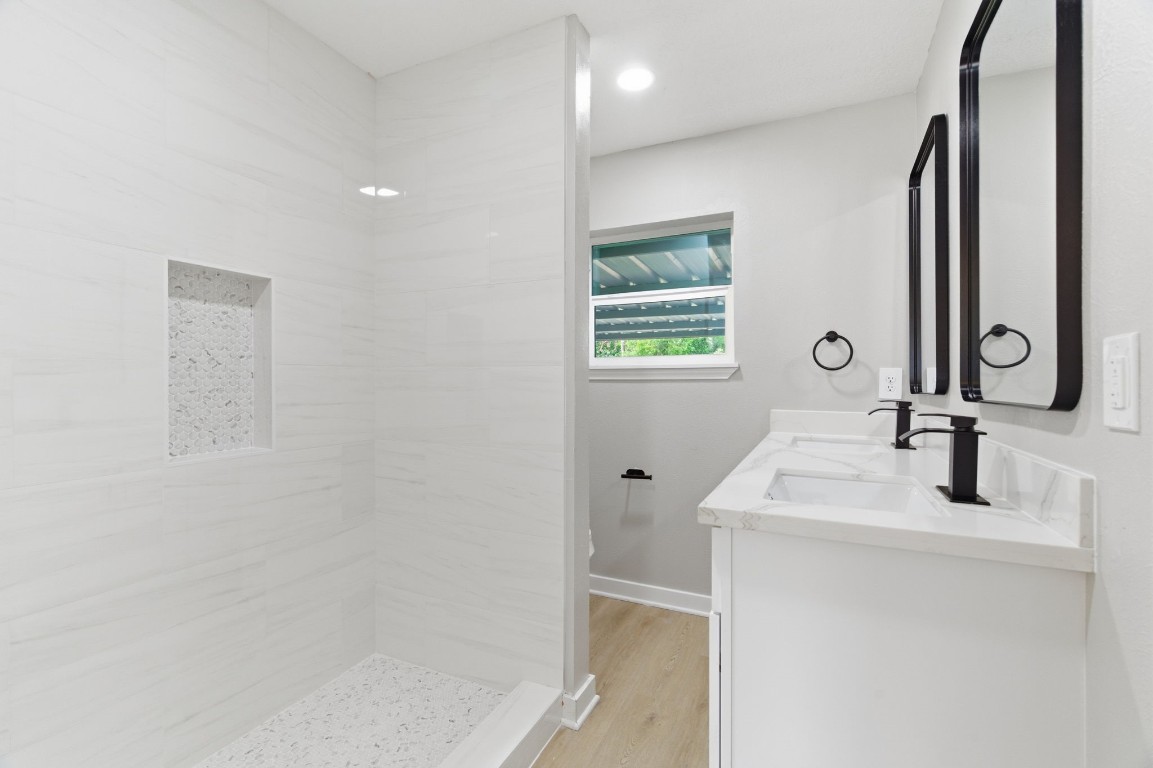 2208 Merle Street Pasadena, TX 77502 - Photo 20 of 26 a bathroom with a sink and a mirror