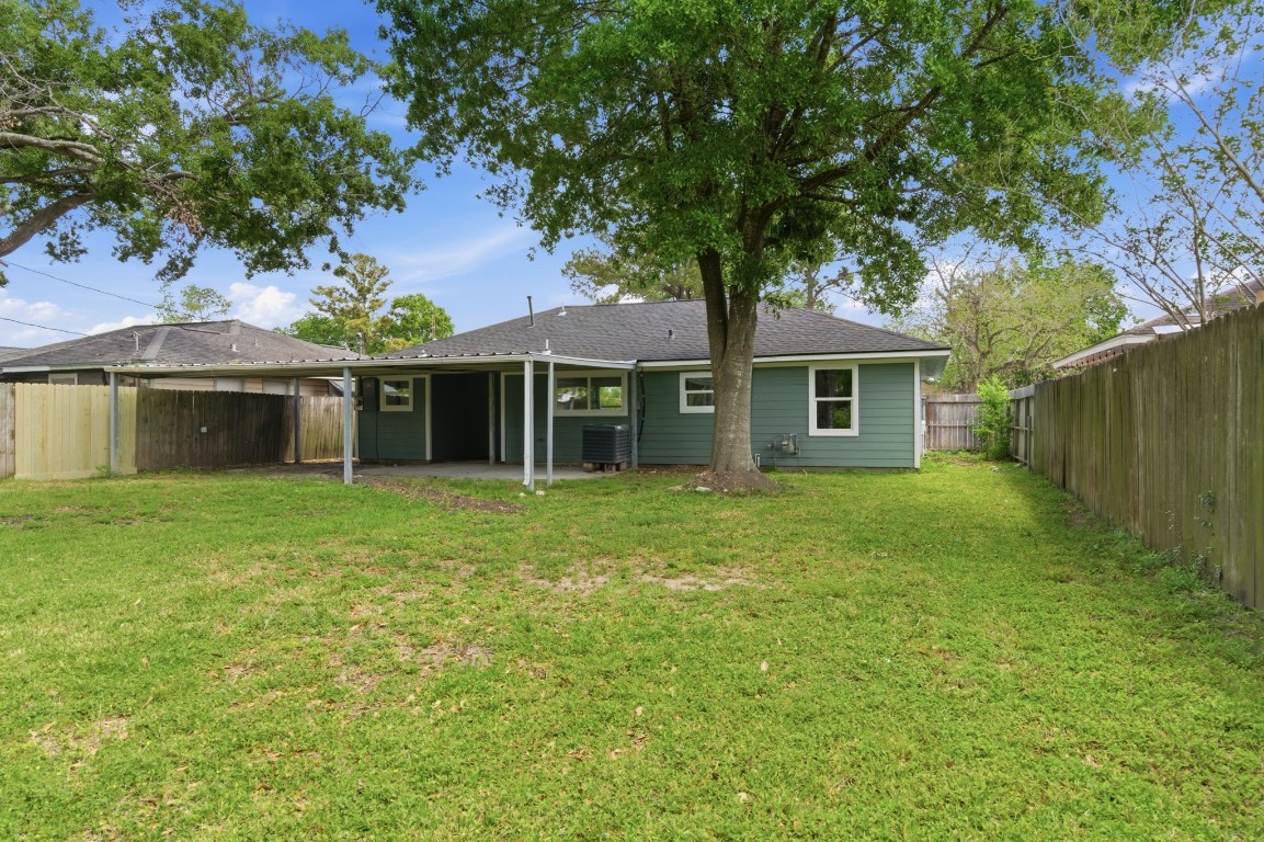 2208 Merle Street Pasadena, TX 77502 - Photo 24 of 26 a front view of a house with a garden