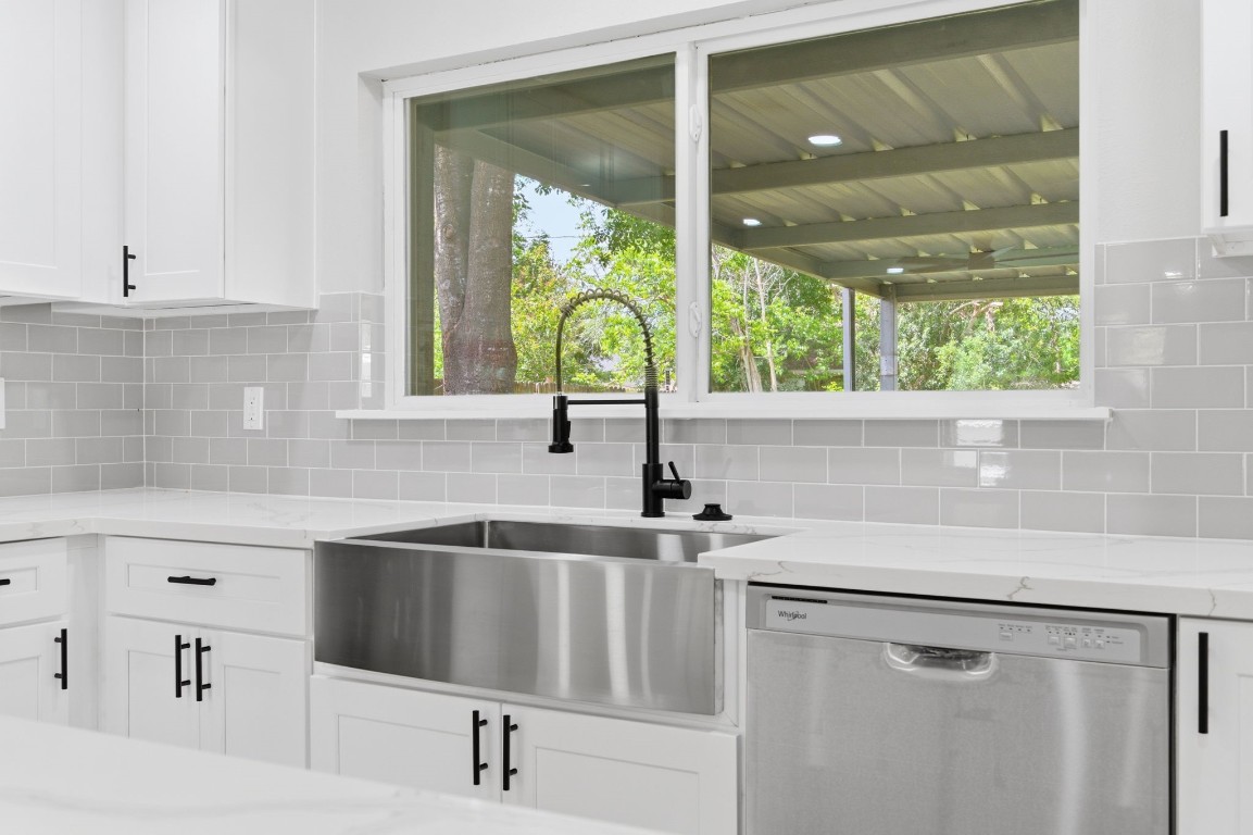 2208 Merle Street Pasadena, TX 77502 - Photo 9 of 26 a kitchen with a sink and a window