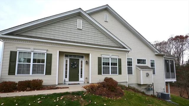 front view of a house with a yard