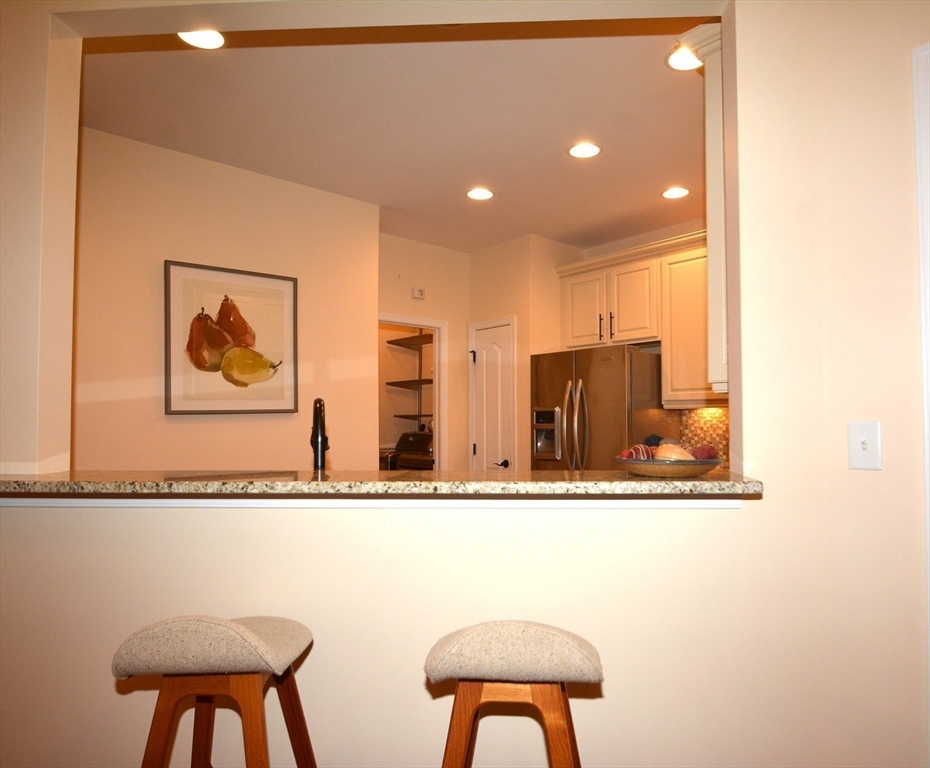 46 Hopkins Circle, Unit 46 Methuen, MA 01844 - Photo 14 of 39 a view of a chair in a room