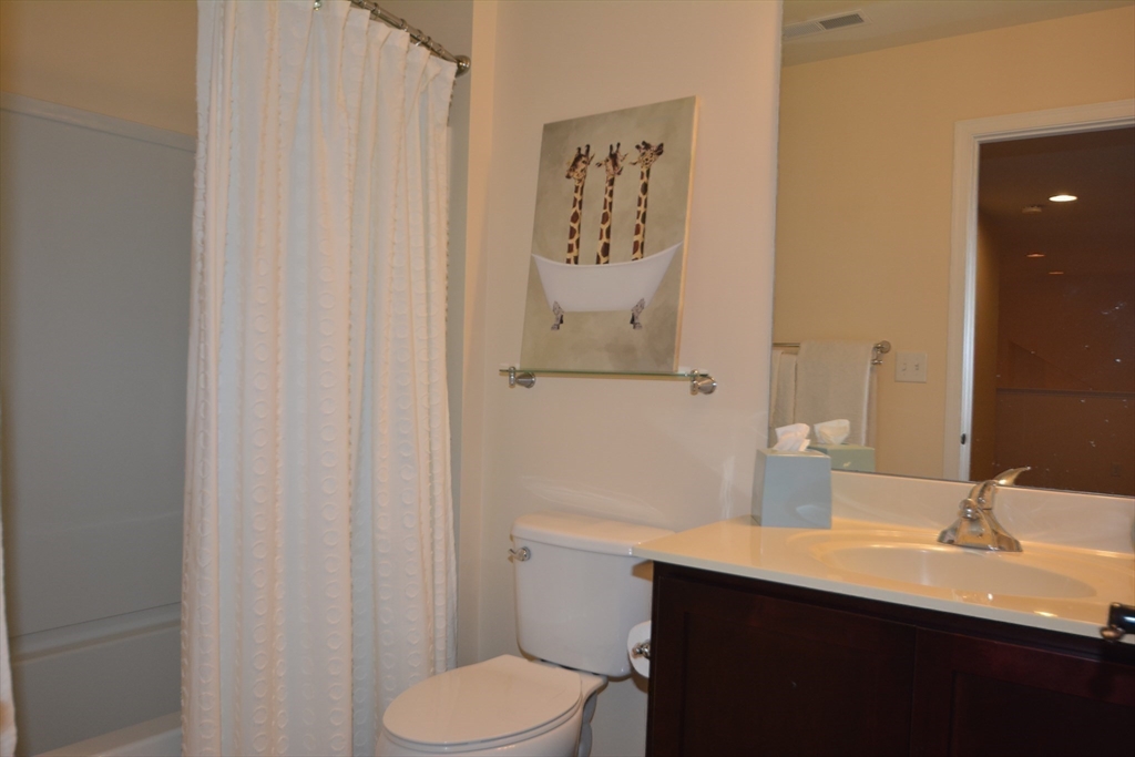 46 Hopkins Circle, Unit 46 Methuen, MA 01844 - Photo 25 of 39 a bathroom with a sink and a toilet