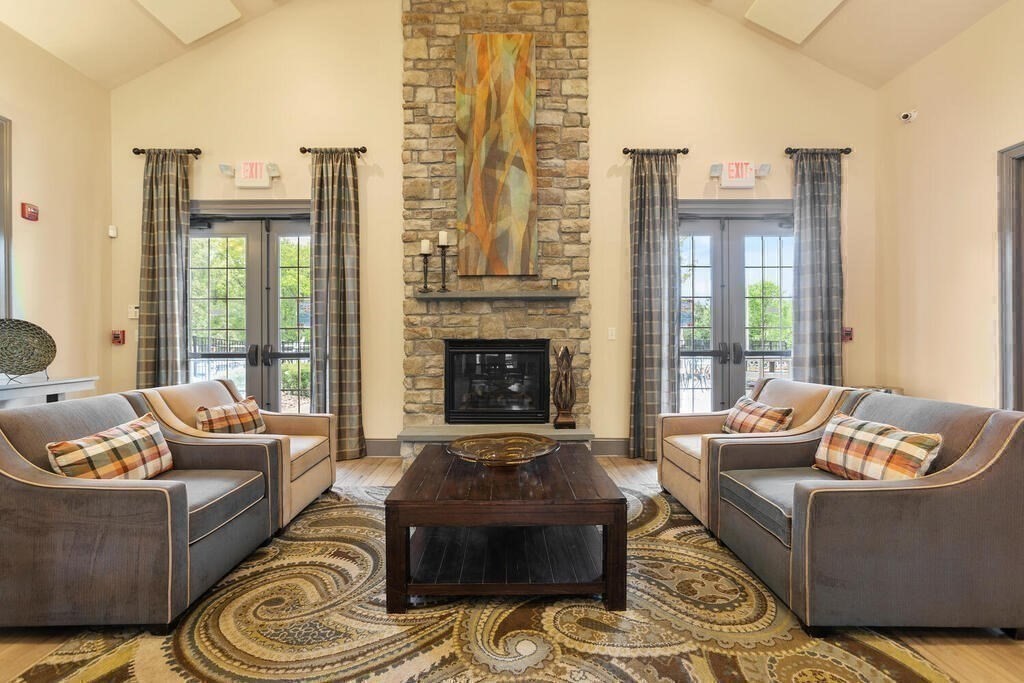46 Hopkins Circle, Unit 46 Methuen, MA 01844 - Photo 33 of 39 a living room with furniture and a fireplace