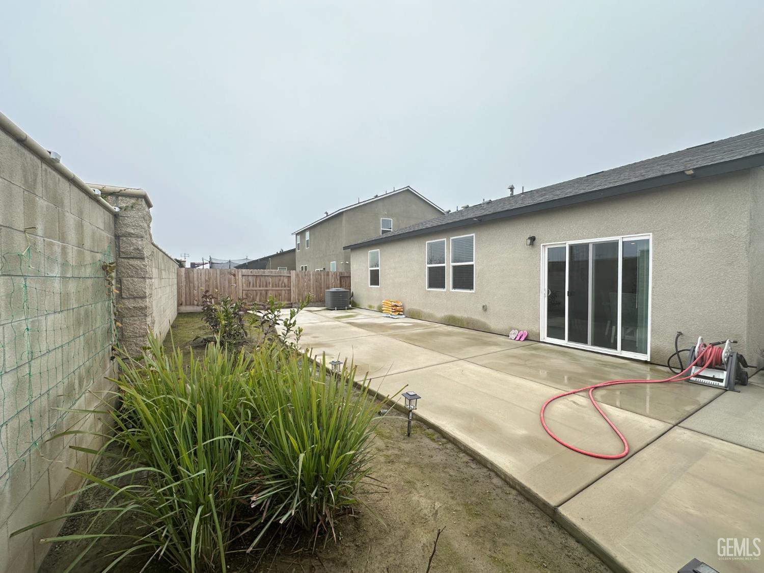 a house view with a outdoor space
