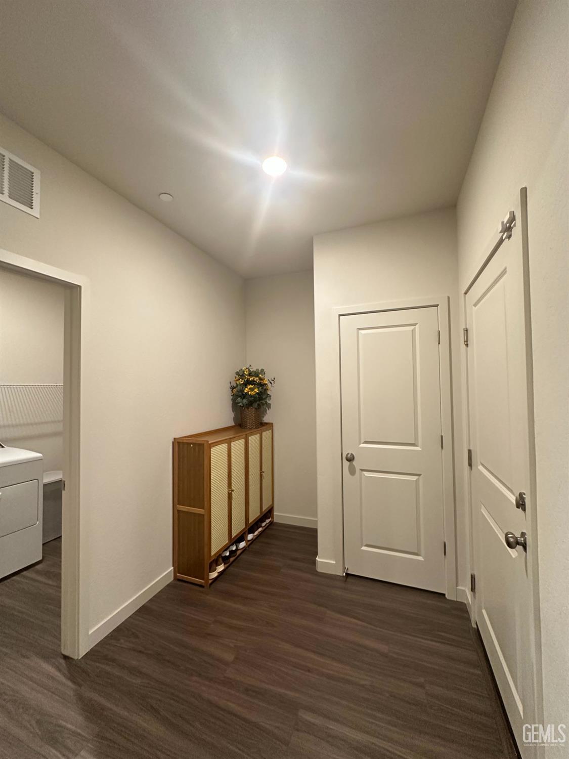 Undisclosed Address Hanford, CA 93230 - Photo 19 of 26 an empty room with wooden floor and closet