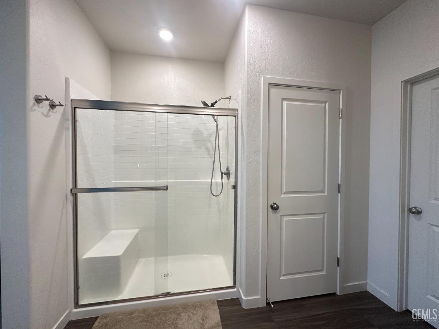 Undisclosed Address Hanford, CA 93230 - Photo 22 of 26 a bathroom with a glass shower door