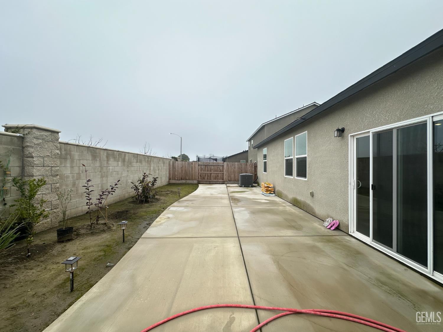 Undisclosed Address Hanford, CA 93230 - Photo 26 of 26 a view of a house with a backyard