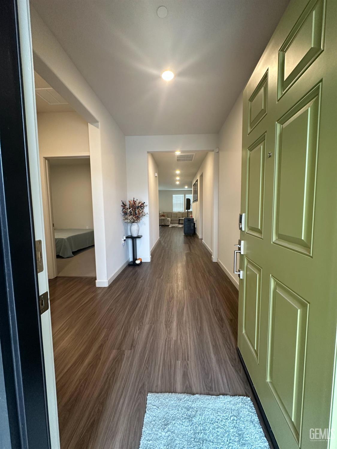 Undisclosed Address Hanford, CA 93230 - Photo 9 of 26 a view of a hallway view with wooden floor and seating