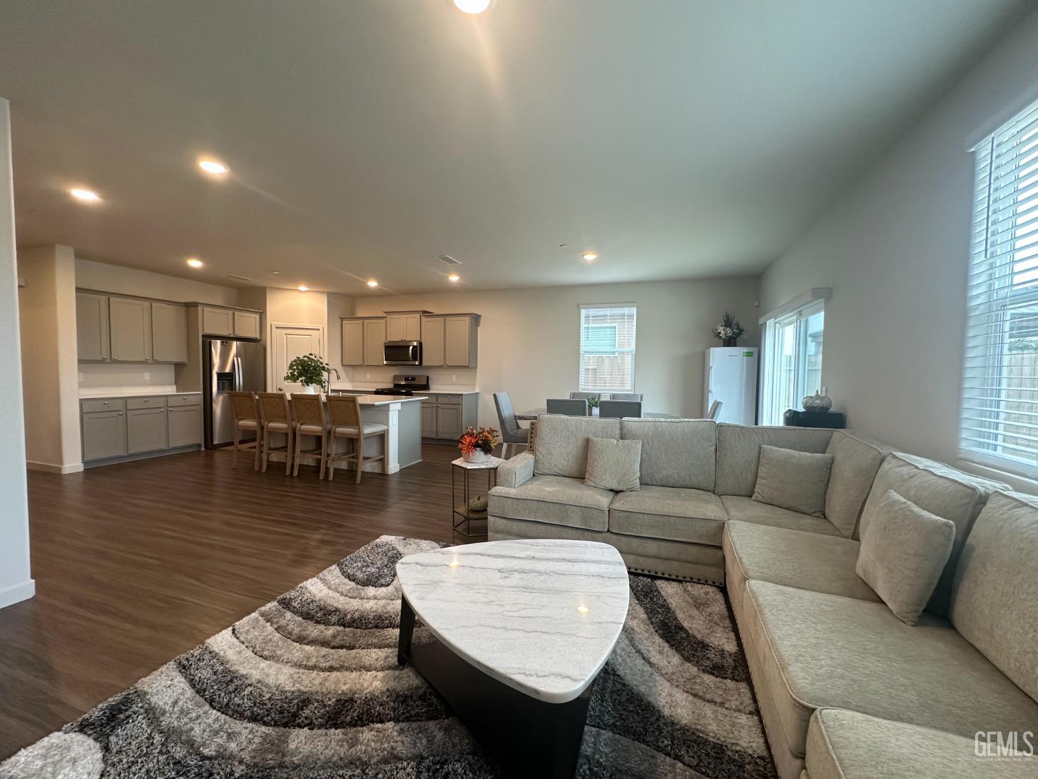 Undisclosed Address Hanford, CA 93230 - Photo 10 of 26 a living room with furniture and a wooden floor
