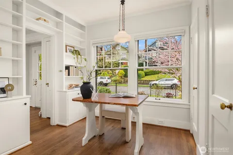a workspace with furniture and a window