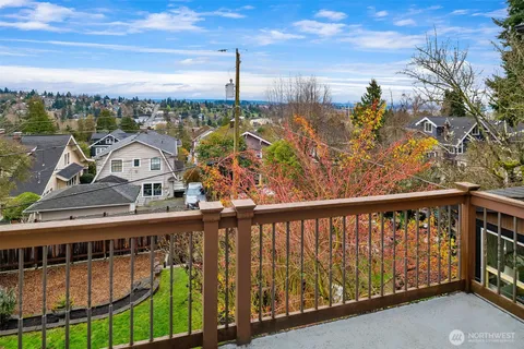 a view of a balcony with wooden floor