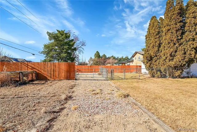 a view of a lake with a sitting area