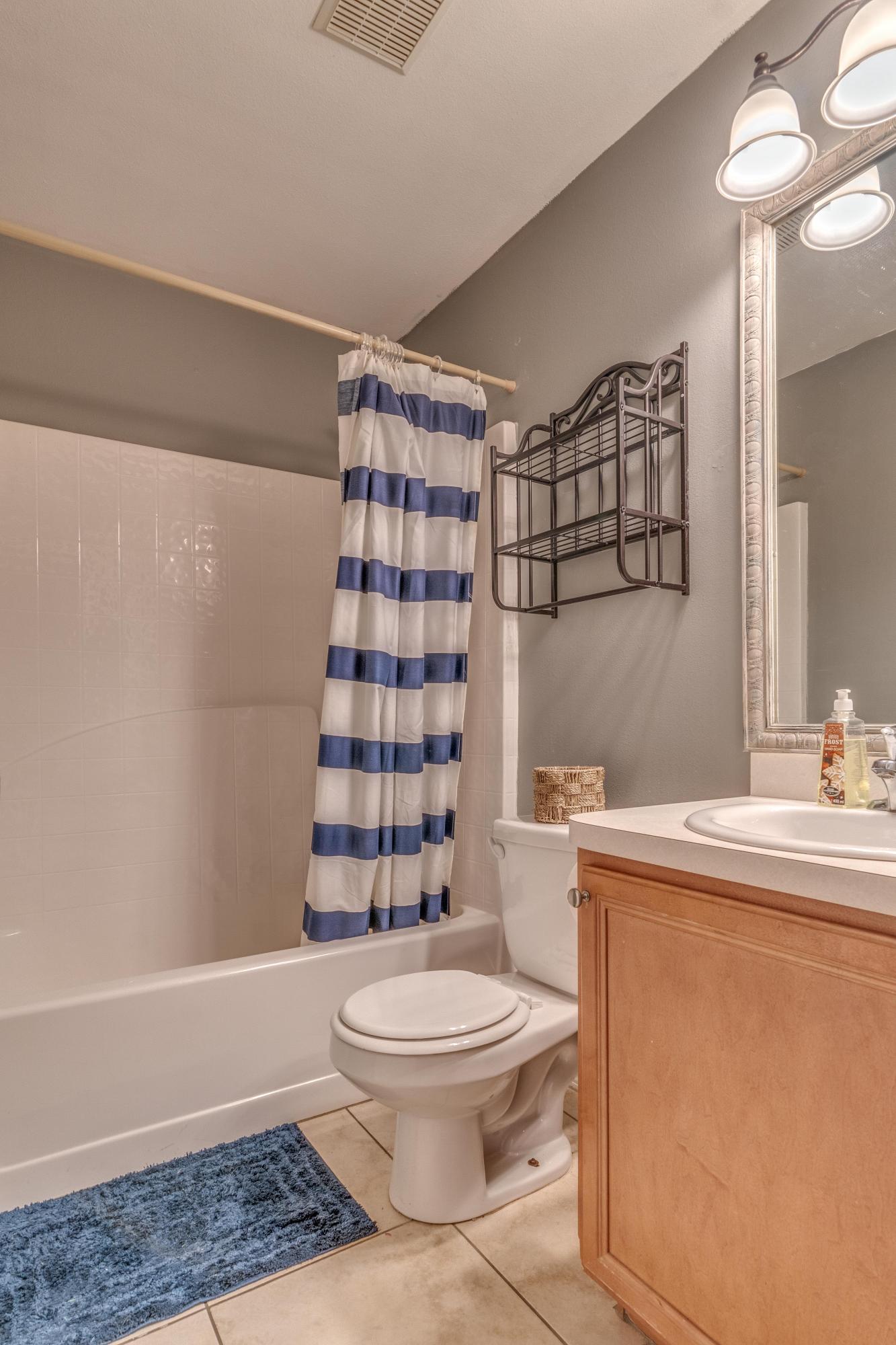 118 Cabana Way Crestview, FL 32536 - Photo 12 of 22 a bathroom with a sink a toilet and shower