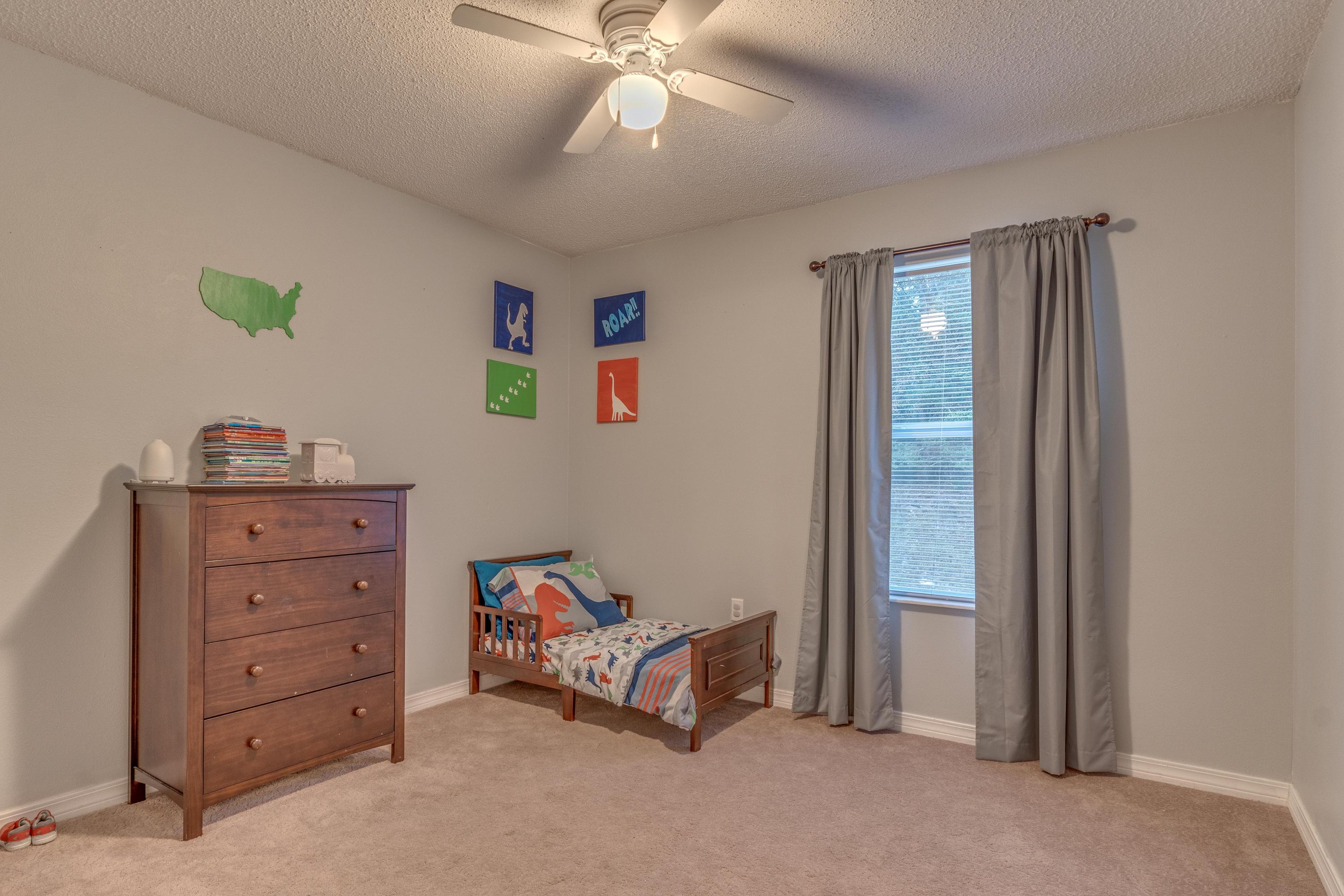 118 Cabana Way Crestview, FL 32536 - Photo 13 of 22 a room with a dresser and a mirror