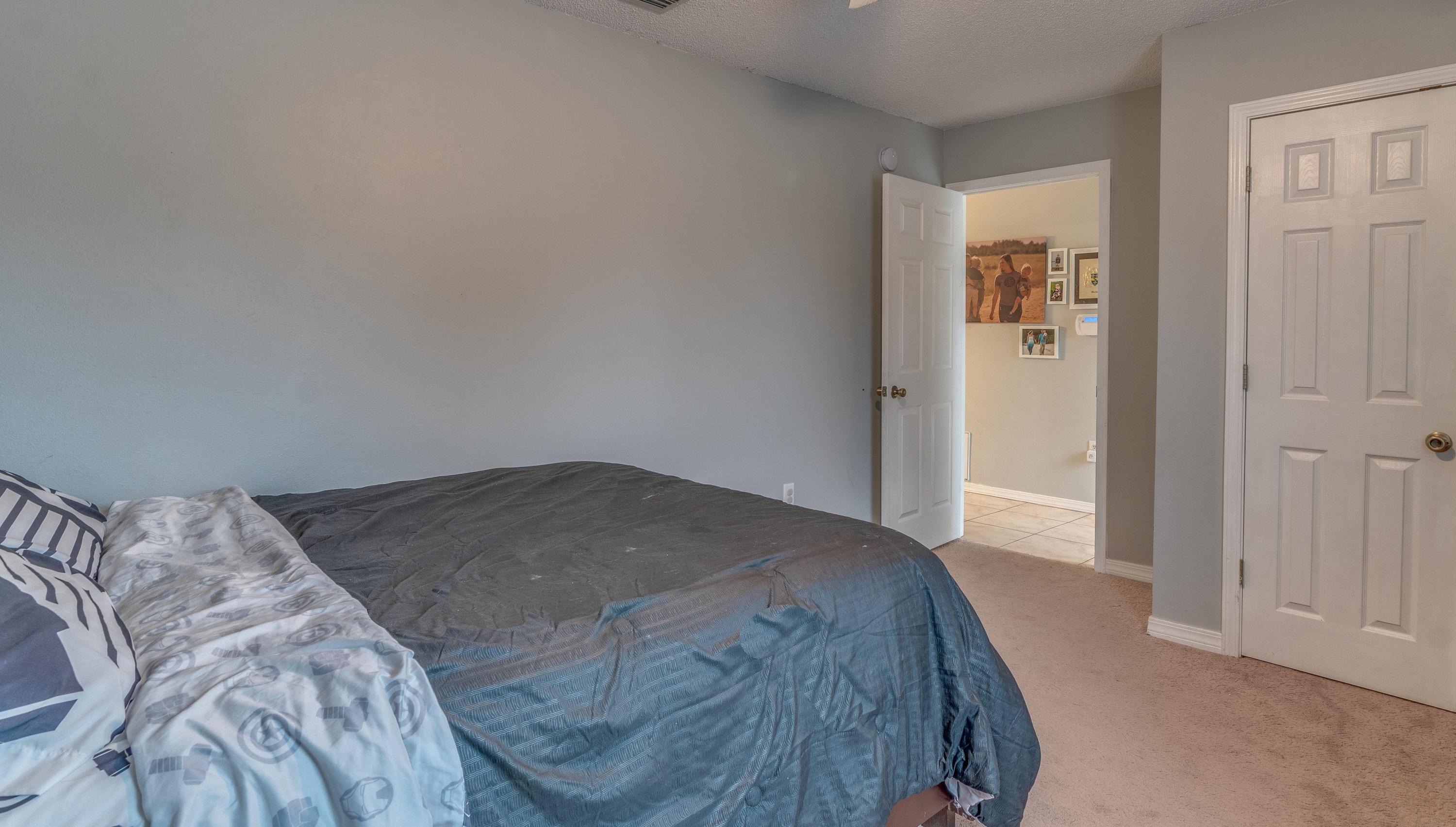 118 Cabana Way Crestview, FL 32536 - Photo 14 of 22 a bedroom with a bed and a window