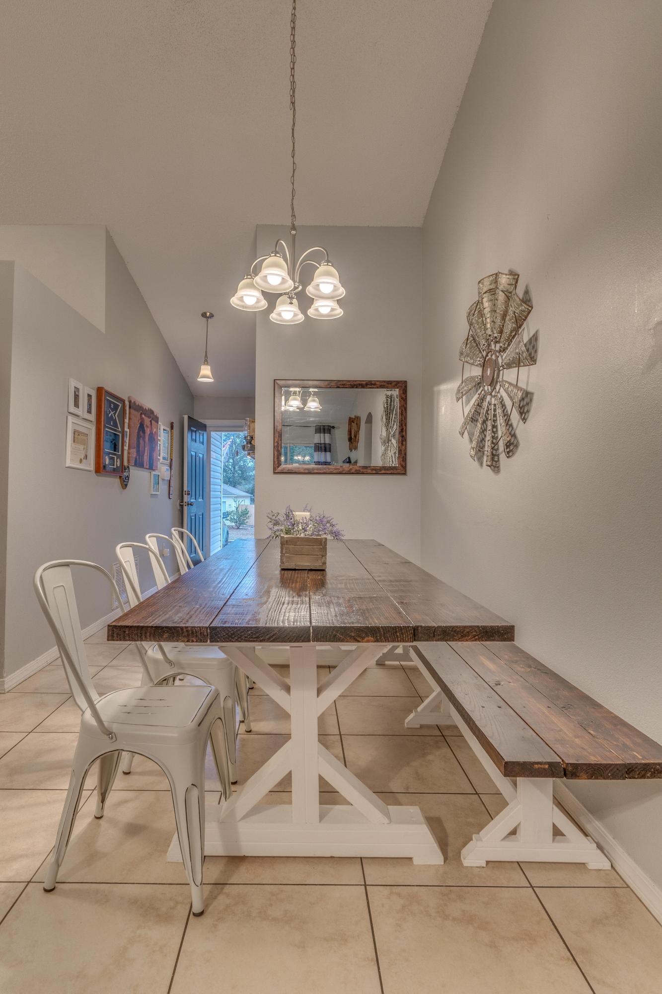 118 Cabana Way Crestview, FL 32536 - Photo 9 of 22 a view of a dining room with furniture and chandelier