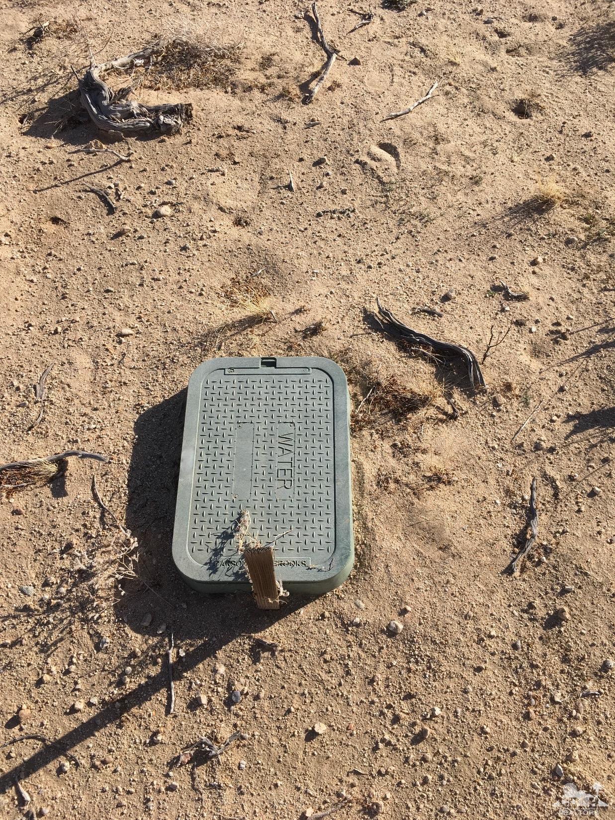 0 Brant Crossing Road Joshua Tree, CA 92252 - Photo 3 of 22 a view of bench in the backyard