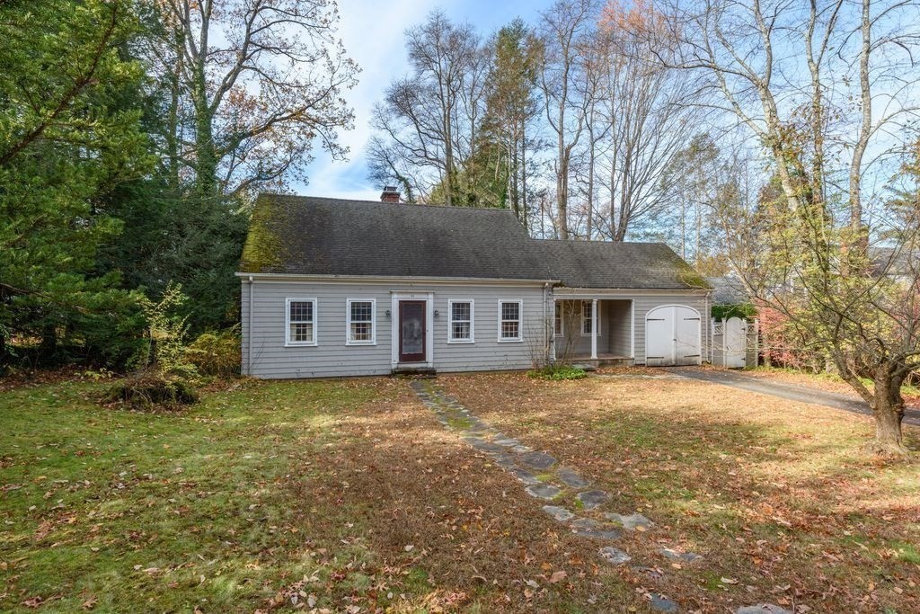 88 Farview Way Amherst, MA 01002 - Photo 2 of 25 a view of a yard in front of a house with large trees