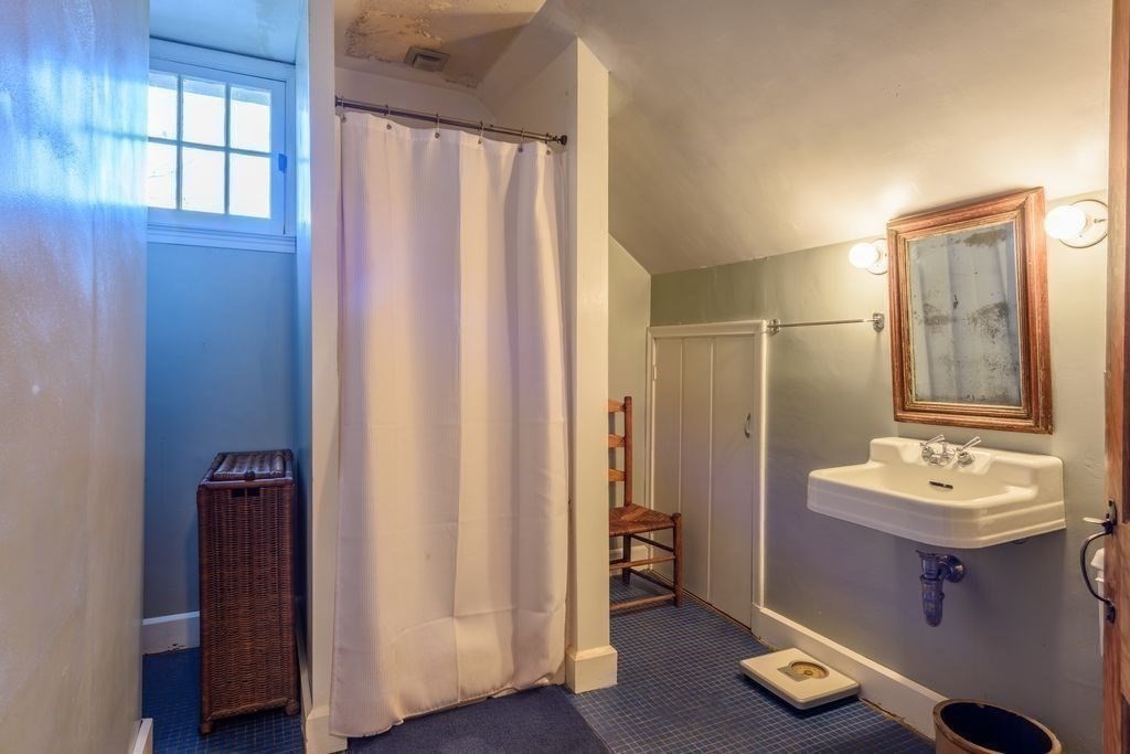 88 Farview Way Amherst, MA 01002 - Photo 21 of 25 a bathroom with a sink mirror and tub