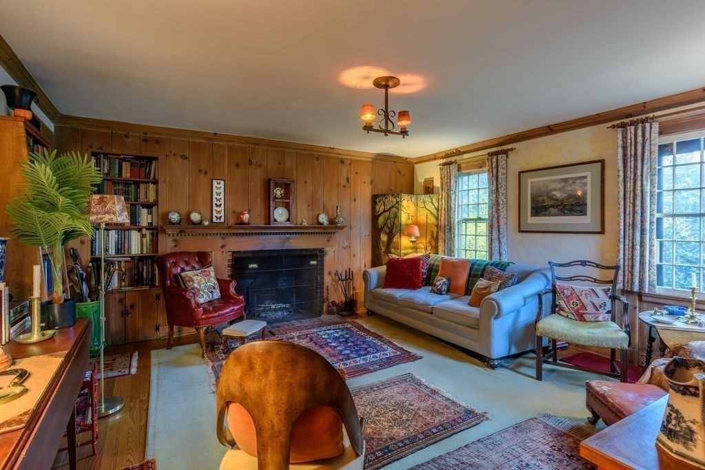 88 Farview Way Amherst, MA 01002 - Photo 9 of 25 a living room with furniture and a fireplace
