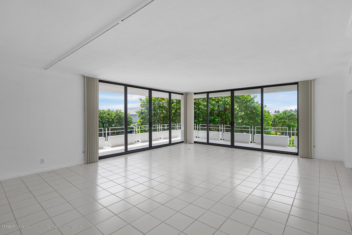 2150 Ibis Isle Road, Unit 8 Palm Beach, FL 33480 - Photo 1 of 31 a view of an empty room with a large window
