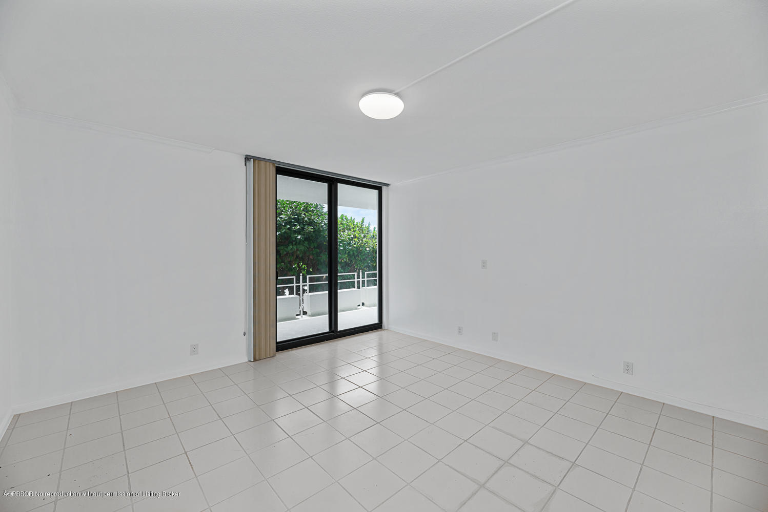 2150 Ibis Isle Road, Unit 8 Palm Beach, FL 33480 - Photo 27 of 31 an empty room with windows