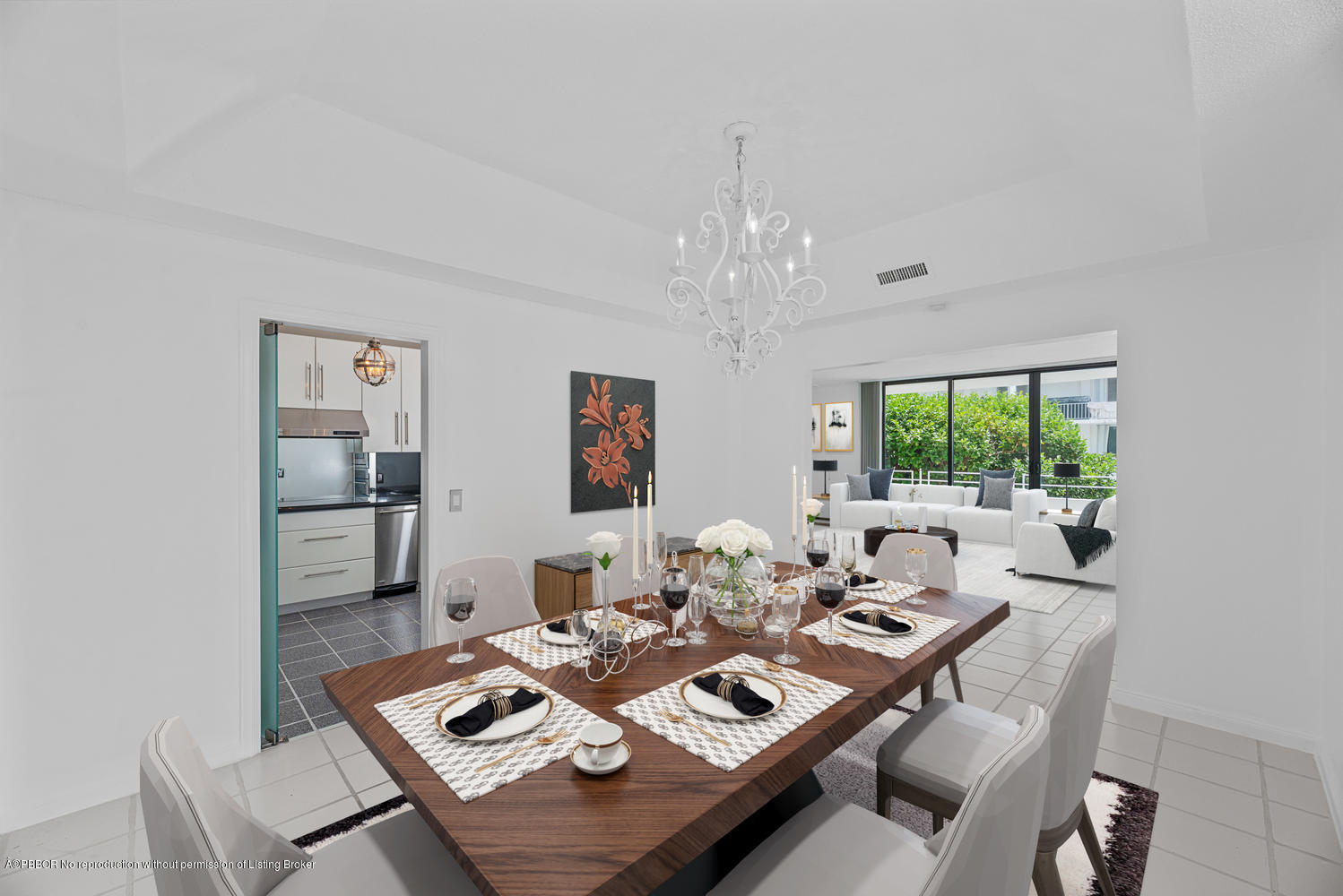 2150 Ibis Isle Road, Unit 8 Palm Beach, FL 33480 - Photo 7 of 31 a view of a dining room with furniture a rug and a chandelier