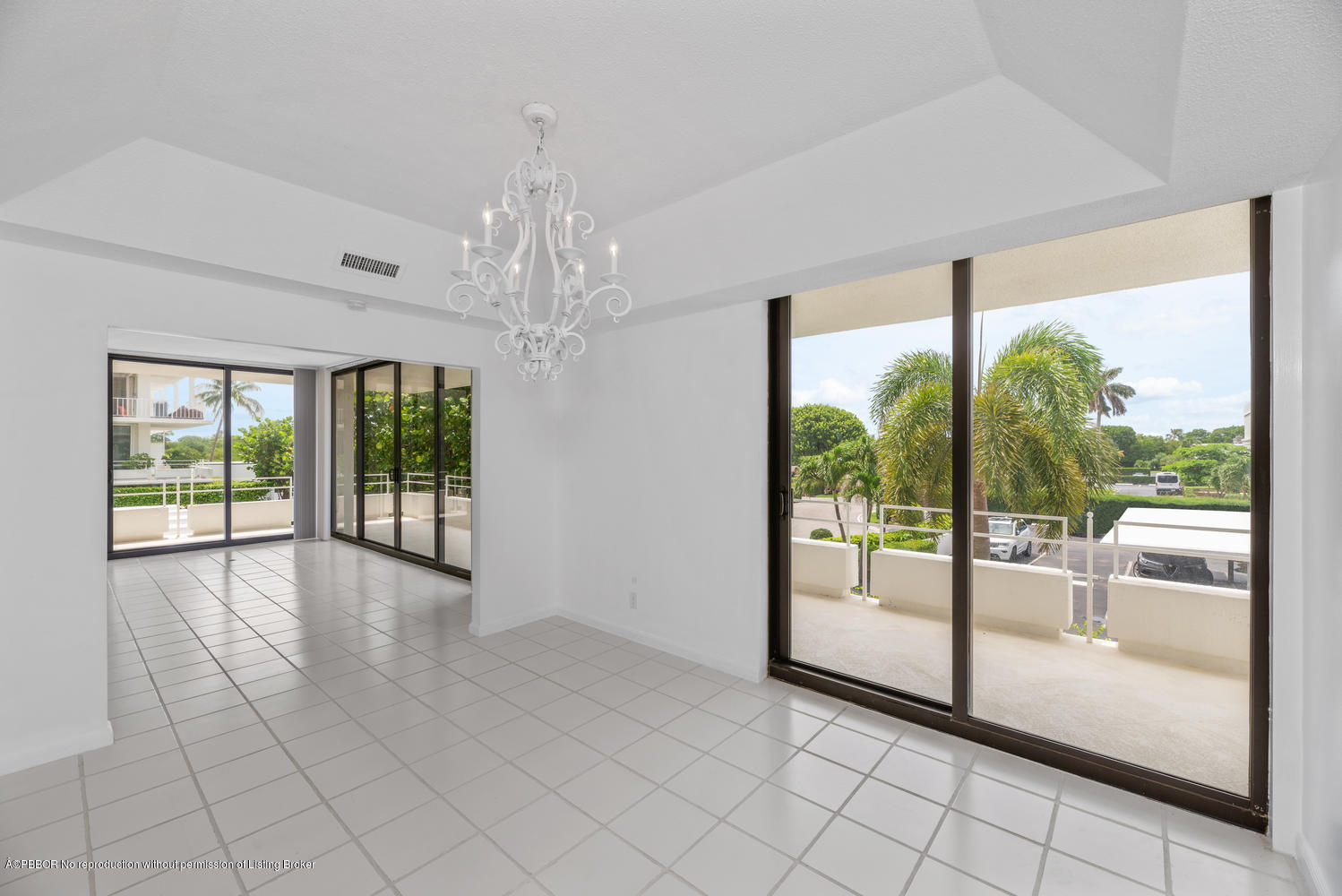 2150 Ibis Isle Road, Unit 8 Palm Beach, FL 33480 - Photo 8 of 31 a view of an empty room with windows