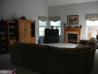 15 Shamrock Road Lumberton, NJ 08048 - Photo 4 of 6 a living room with furniture and a fireplace