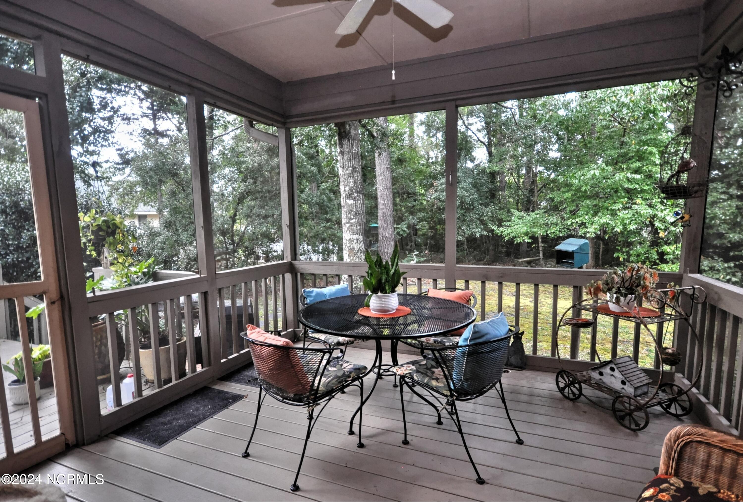 155 Edgewater Circle Sunset Beach, NC 28468 - Photo 24 of 51 Screened Porch