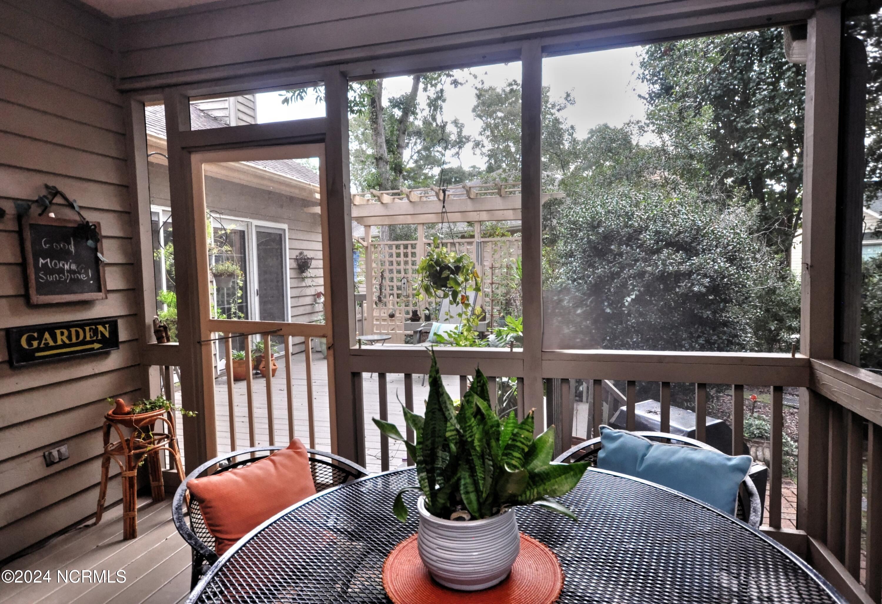 155 Edgewater Circle Sunset Beach, NC 28468 - Photo 26 of 51 Screened Porch3