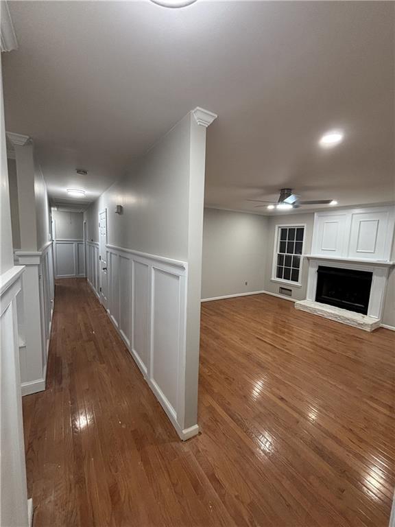 567 Leah Drive Powder Springs, GA 30127 - Photo 2 of 5 a view of a livingroom with wooden floor and a fireplace