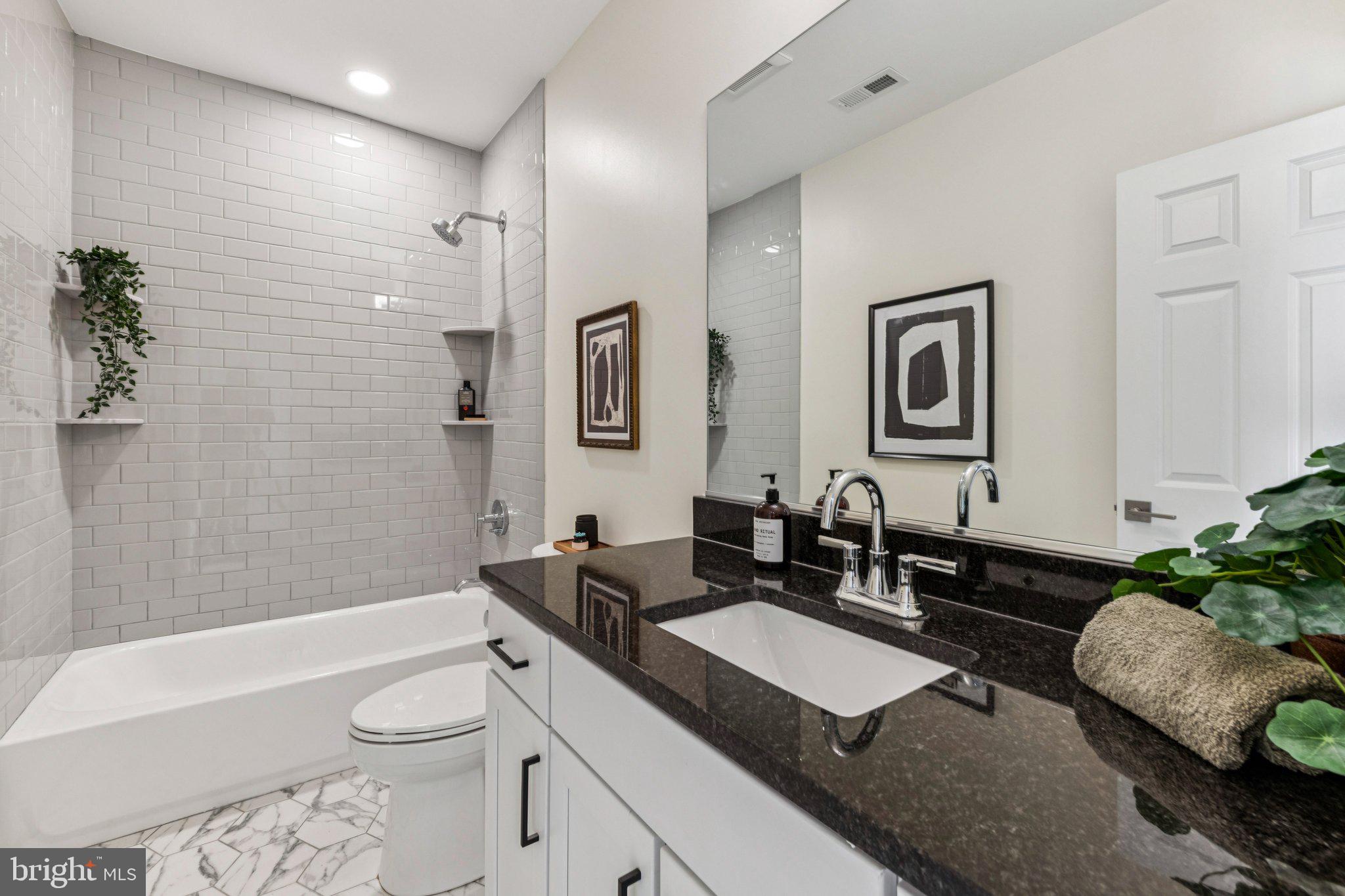 627 Elliott Street Northeast Washington, DC 20002 - Photo 28 of 43 Upstairs Hall Full Bath