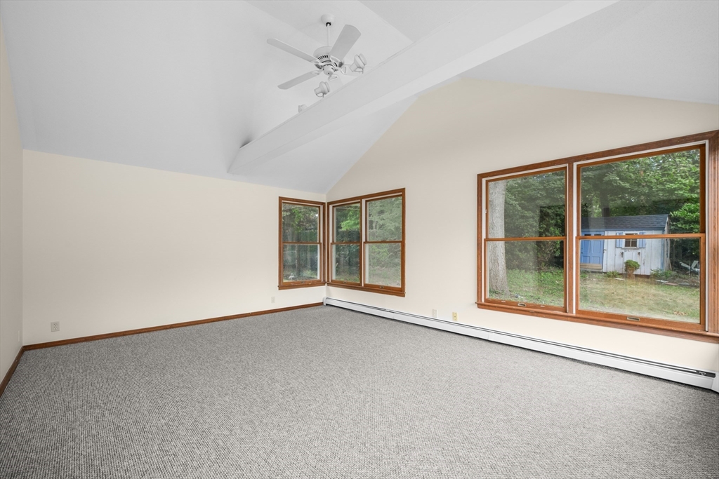 296 Buckskin Path Barnstable, MA 02632 - Photo 9 of 32 a view of an empty room with a window