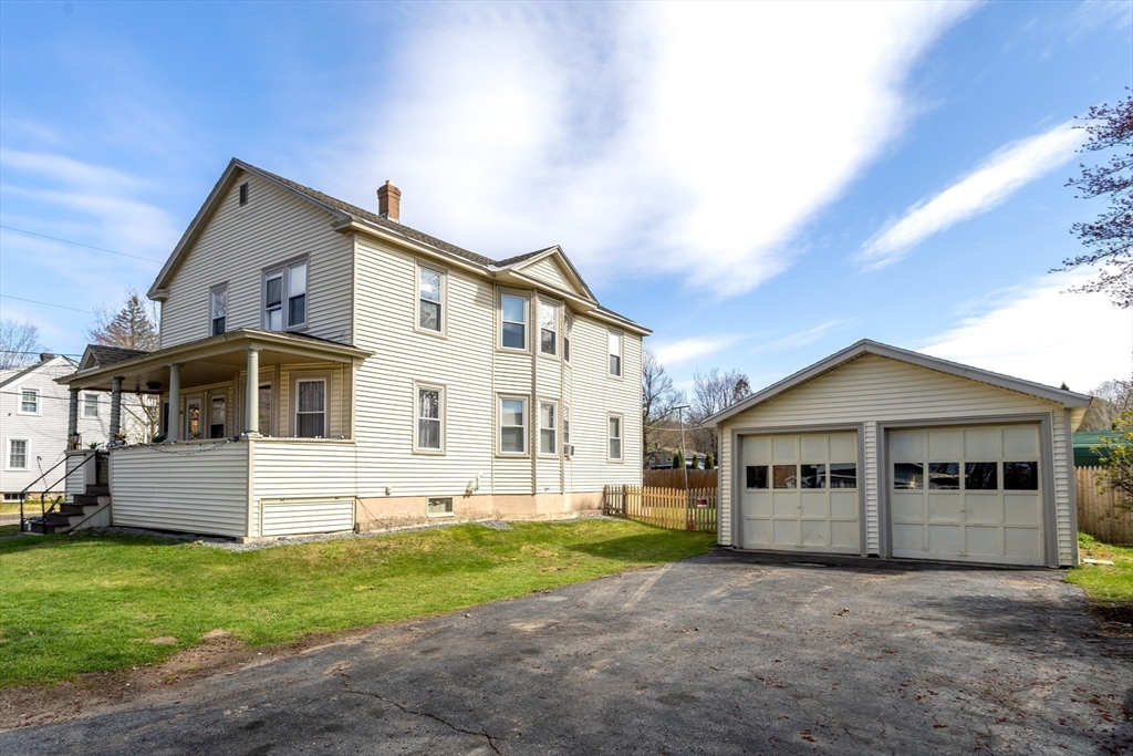 306 Franklin Road Fitchburg, MA 01420 - Photo 27 of 32 a front view of a house with a yard