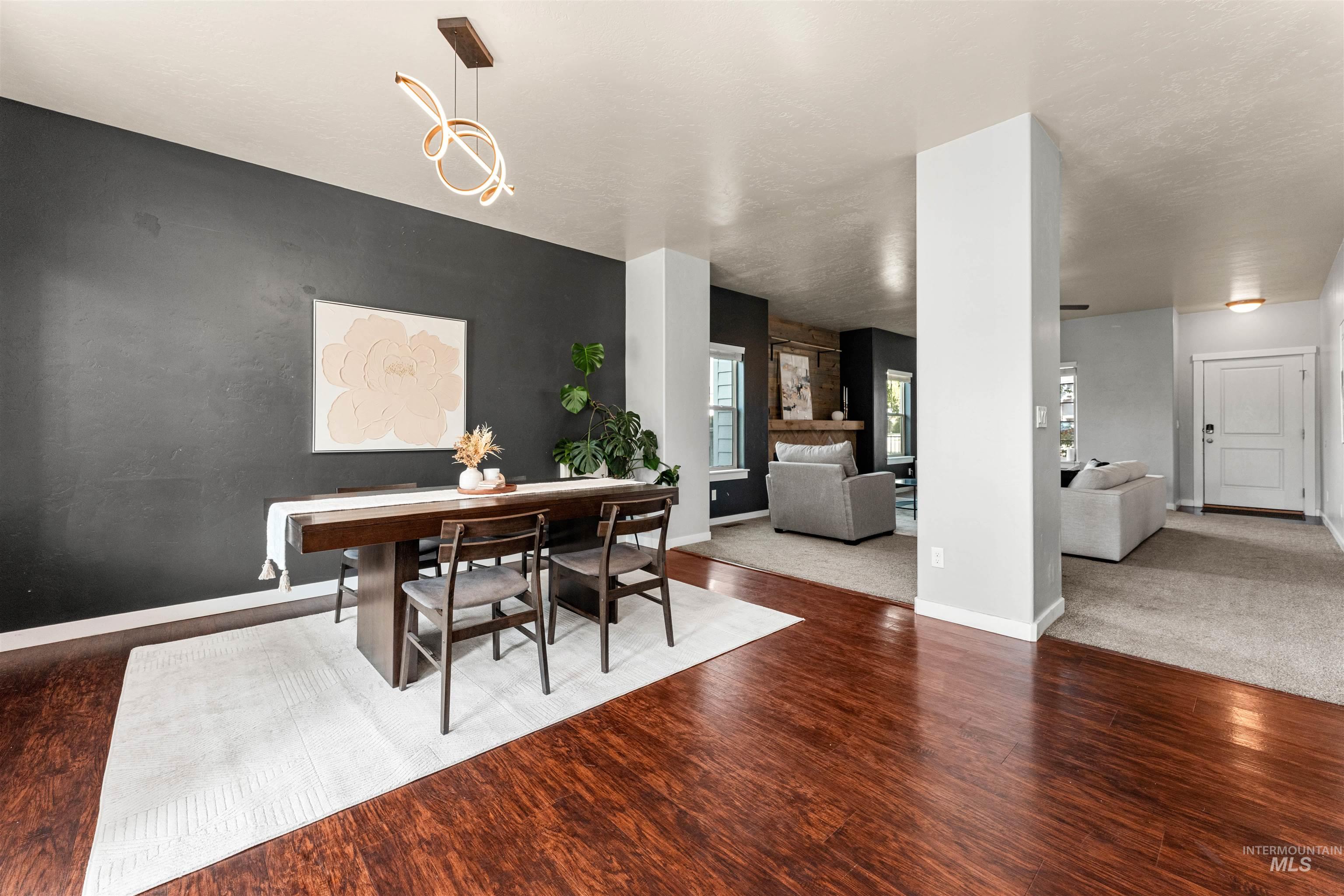 37 East Ensenada Drive Meridian, ID 83646 - Photo 11 of 46 Dining space with baseboards and wood finished floors