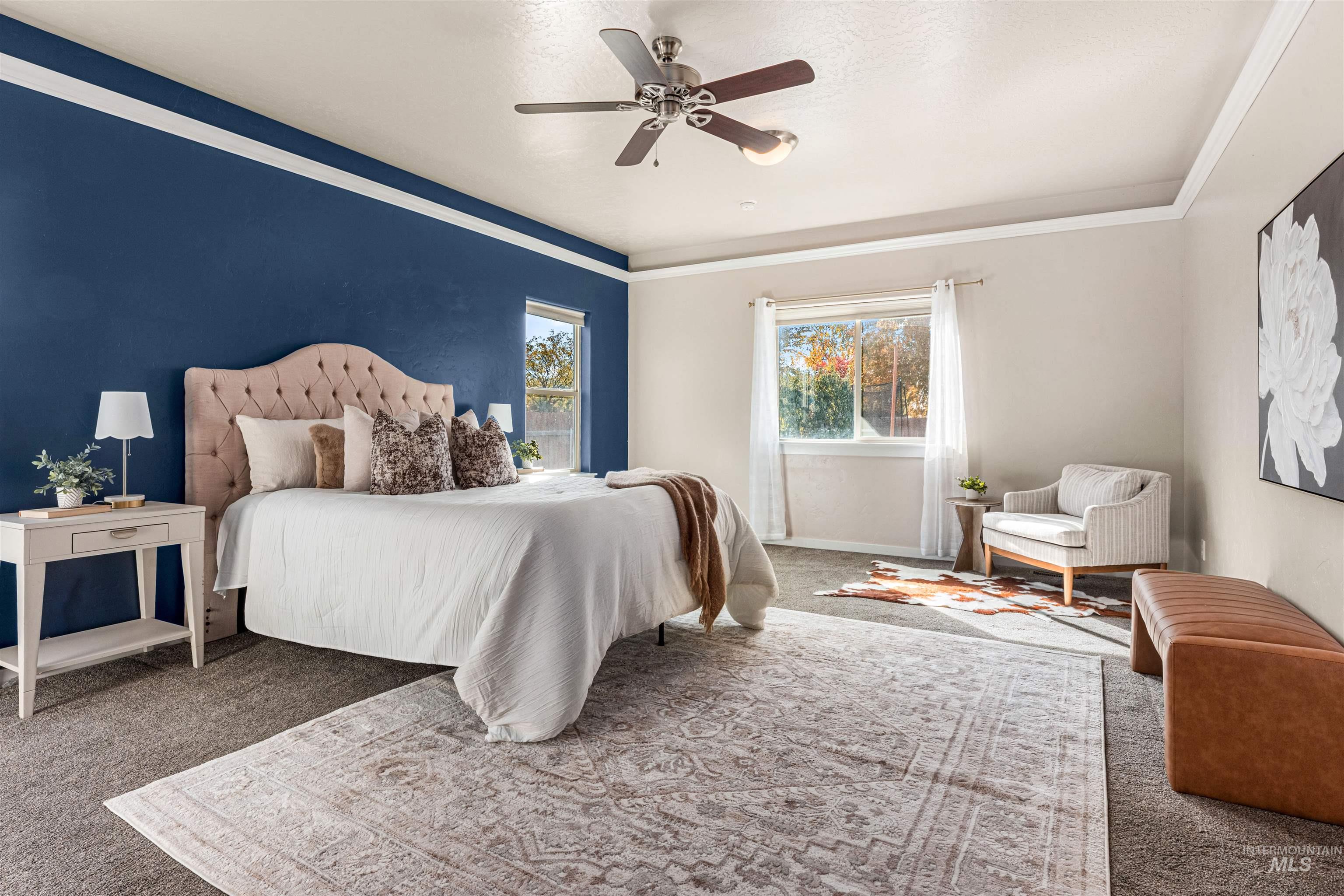 37 East Ensenada Drive Meridian, ID 83646 - Photo 17 of 46 Bedroom with carpet floors, a ceiling fan, and crown molding