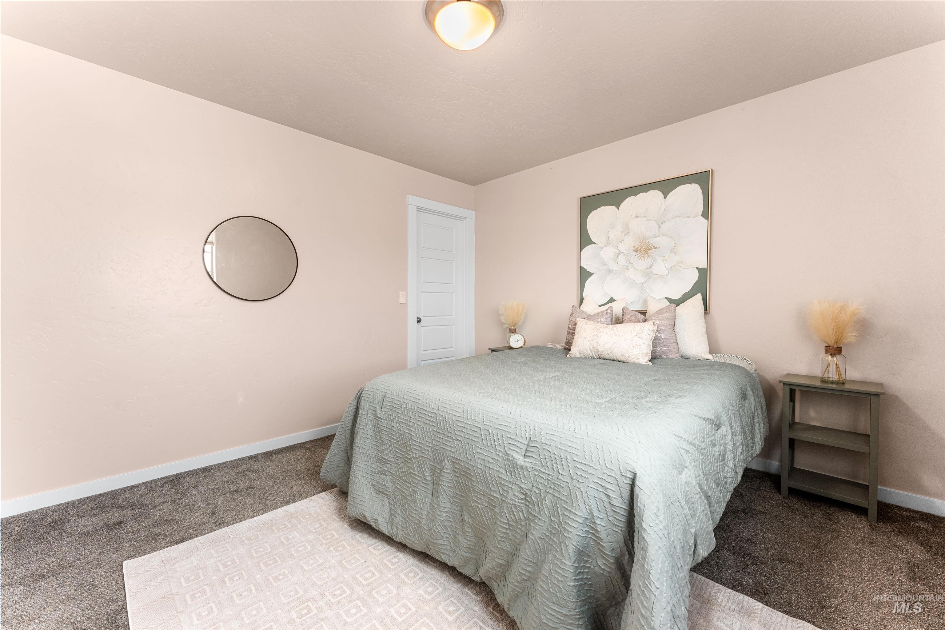 37 East Ensenada Drive Meridian, ID 83646 - Photo 25 of 46 Carpeted bedroom with baseboards