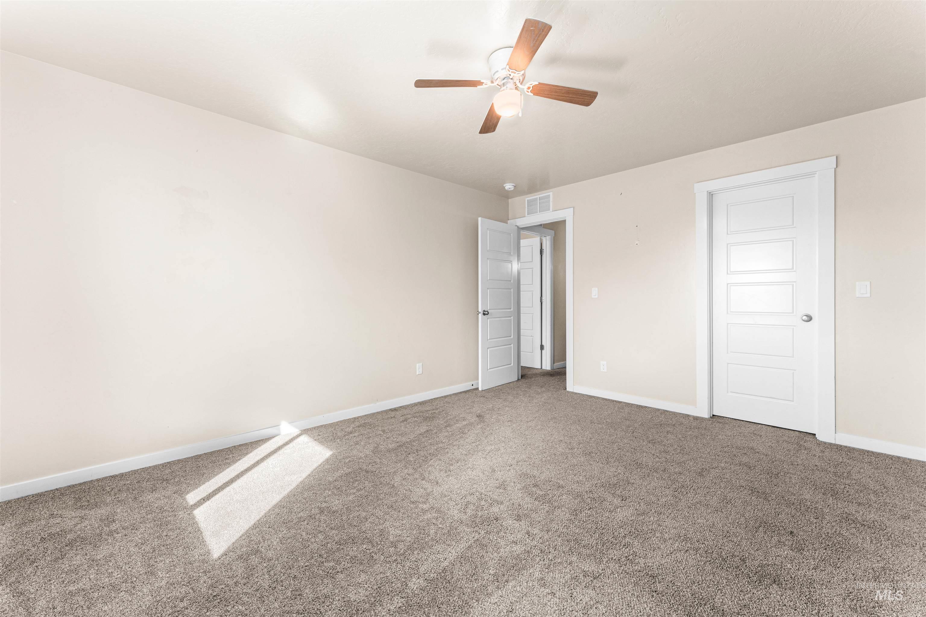 37 East Ensenada Drive Meridian, ID 83646 - Photo 32 of 46 Unfurnished bedroom featuring carpet and ceiling fan