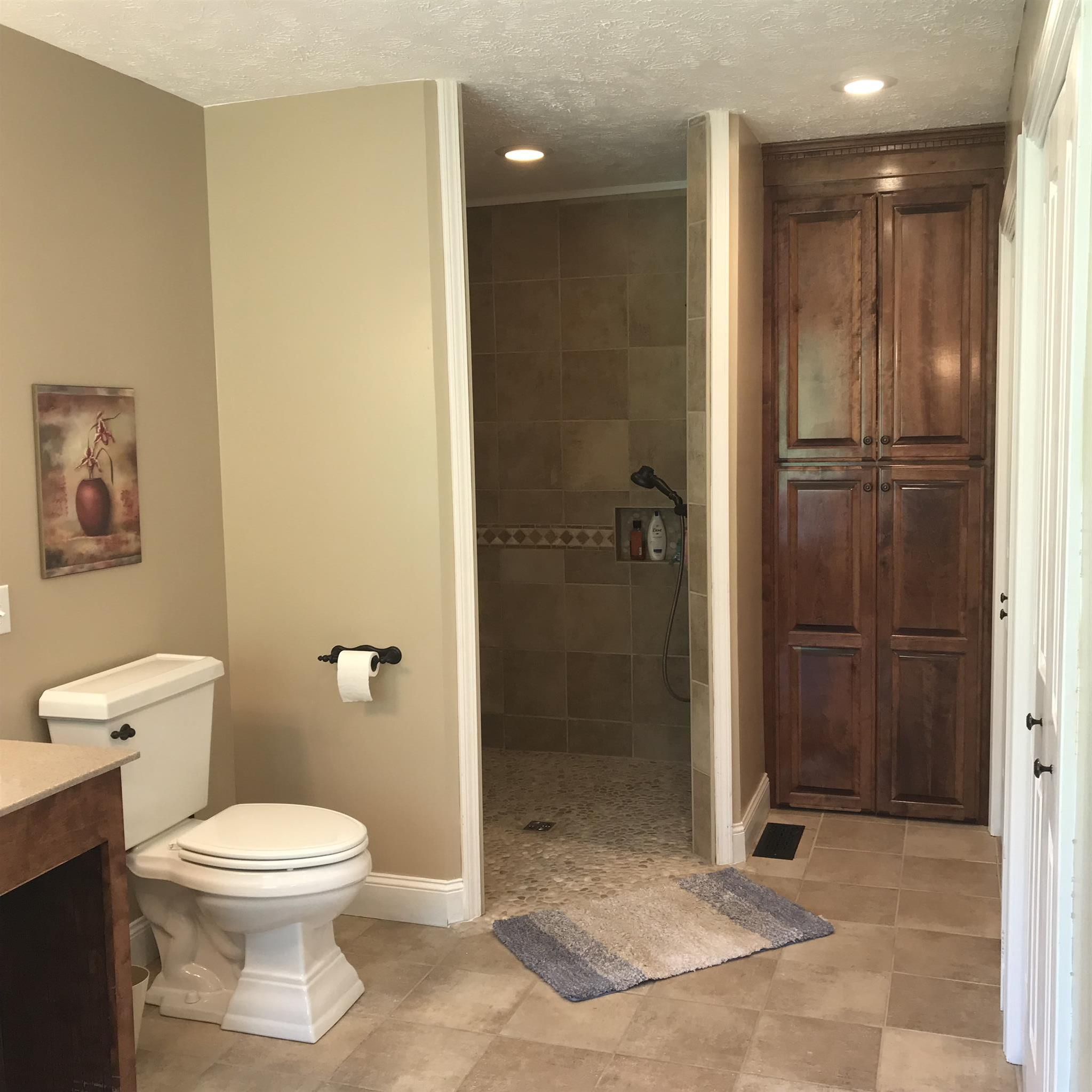 1276 Espy Road Manchester, TN 37355 - Photo 13 of 25 a bathroom with a toilet and a shower