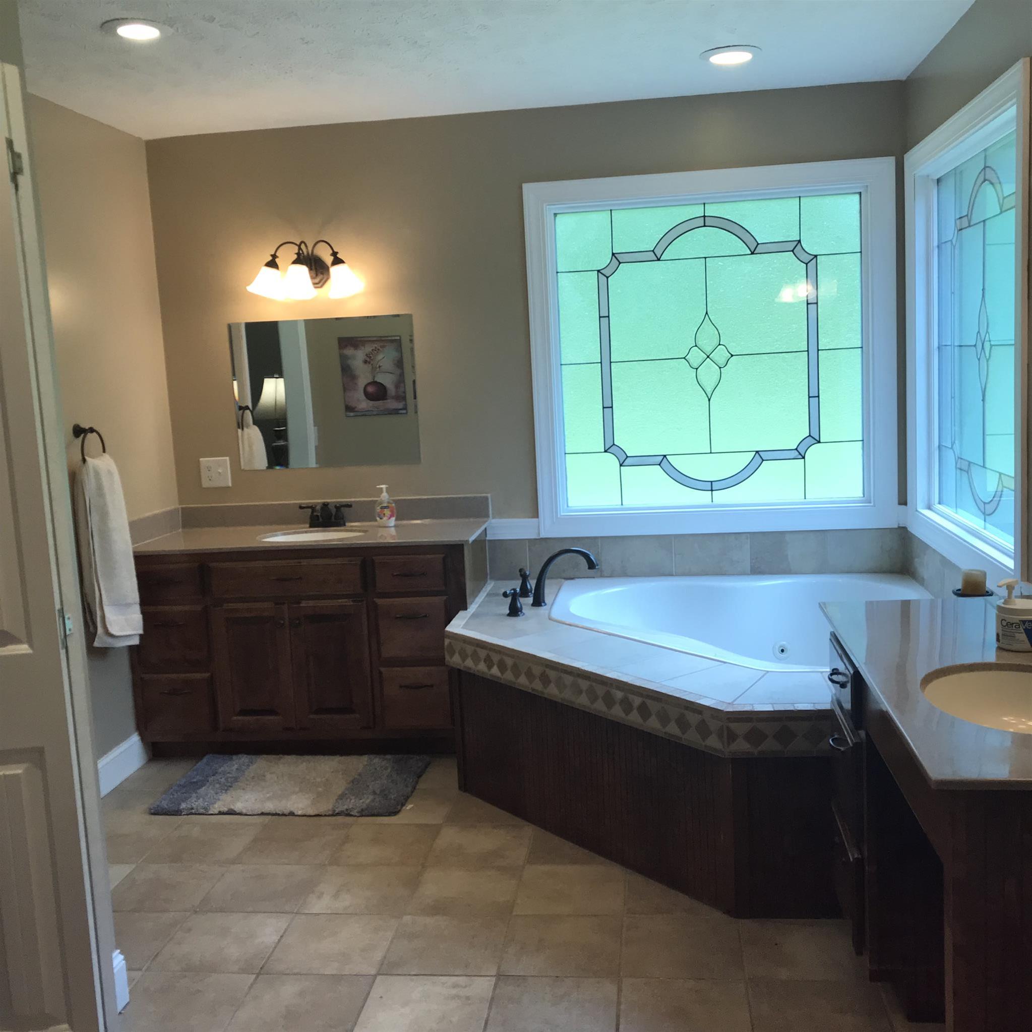 1276 Espy Road Manchester, TN 37355 - Photo 14 of 25 a bathroom with a bathtub sink and window
