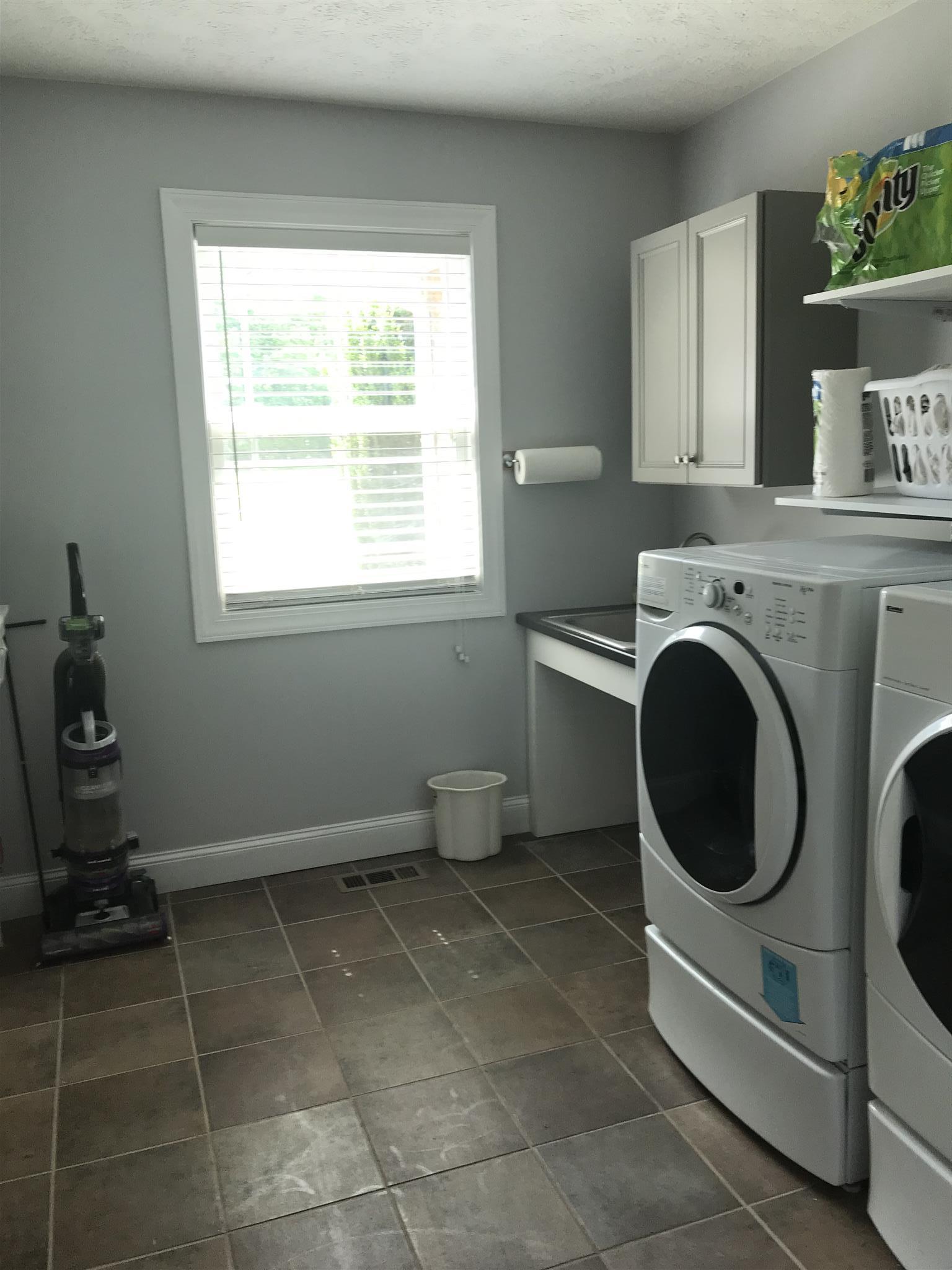 1276 Espy Road Manchester, TN 37355 - Photo 8 of 25 a room with a washer and dryer