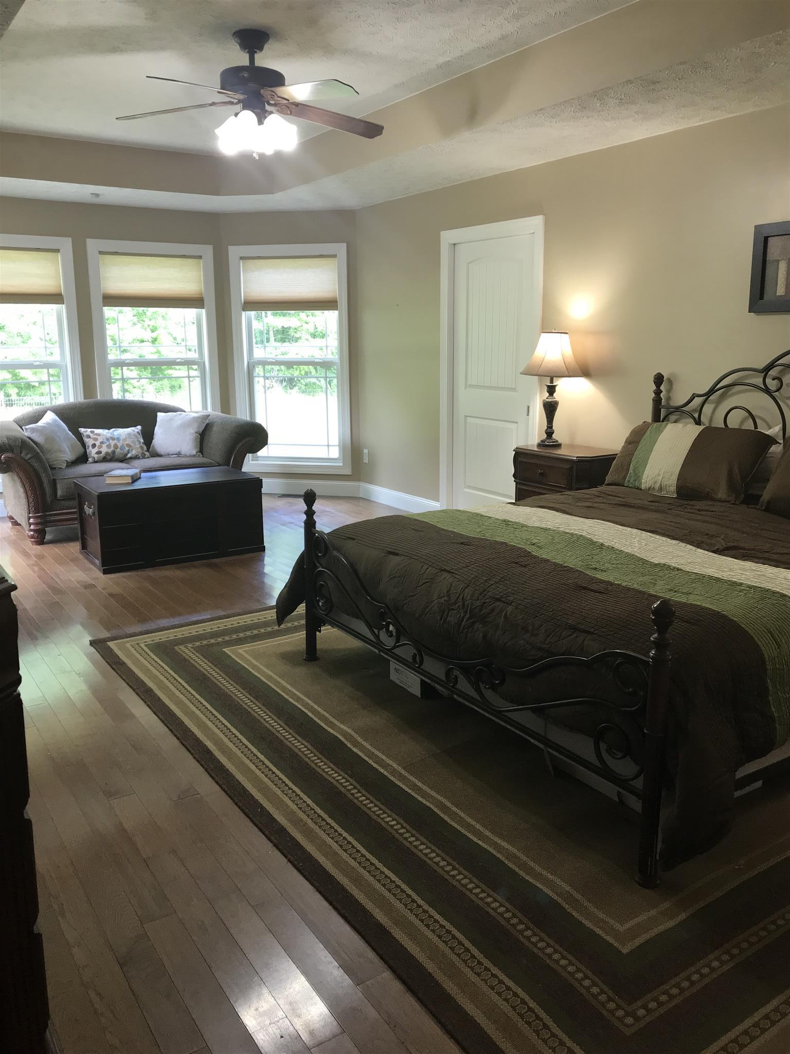 1276 Espy Road Manchester, TN 37355 - Photo 10 of 25 a bedroom with a bed and a large window