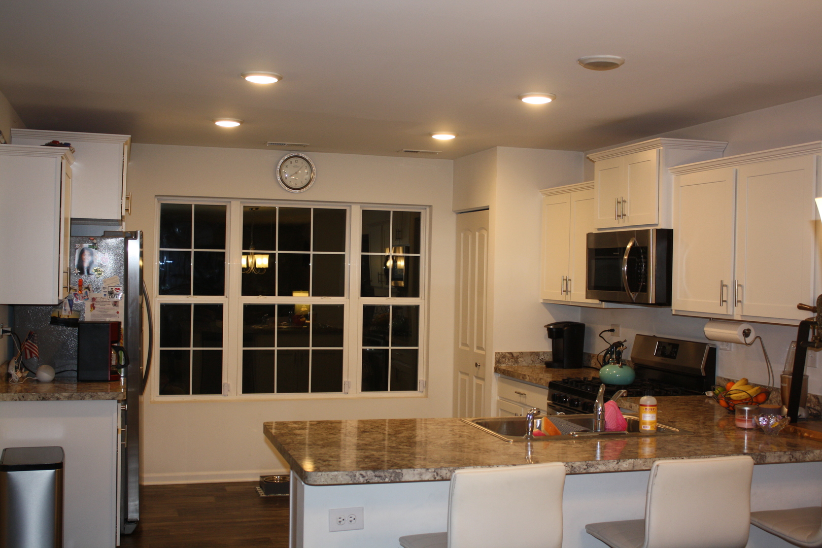 2351 Upland Road Pingree Grove, IL 60140 - Photo 5 of 7 a kitchen with stainless steel appliances granite countertop a stove and a sink