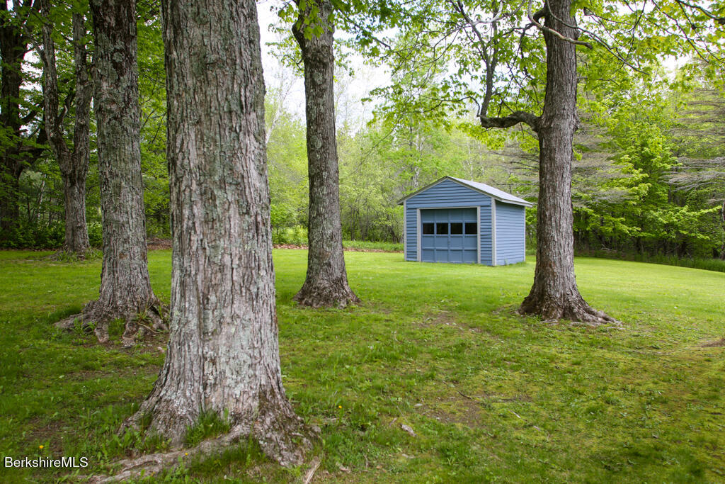 1271 Main Road Savoy, MA 01256 - Photo 36 of 38 a front view of a house with garden